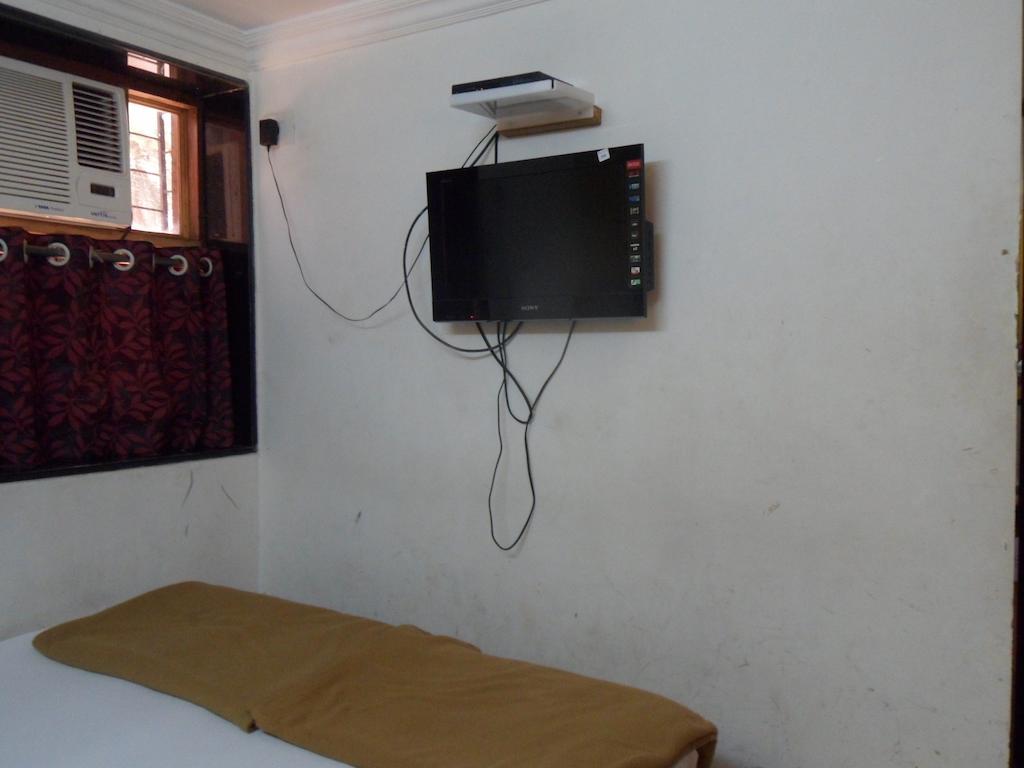 Hotel Happyland Mumbai Rom bilde