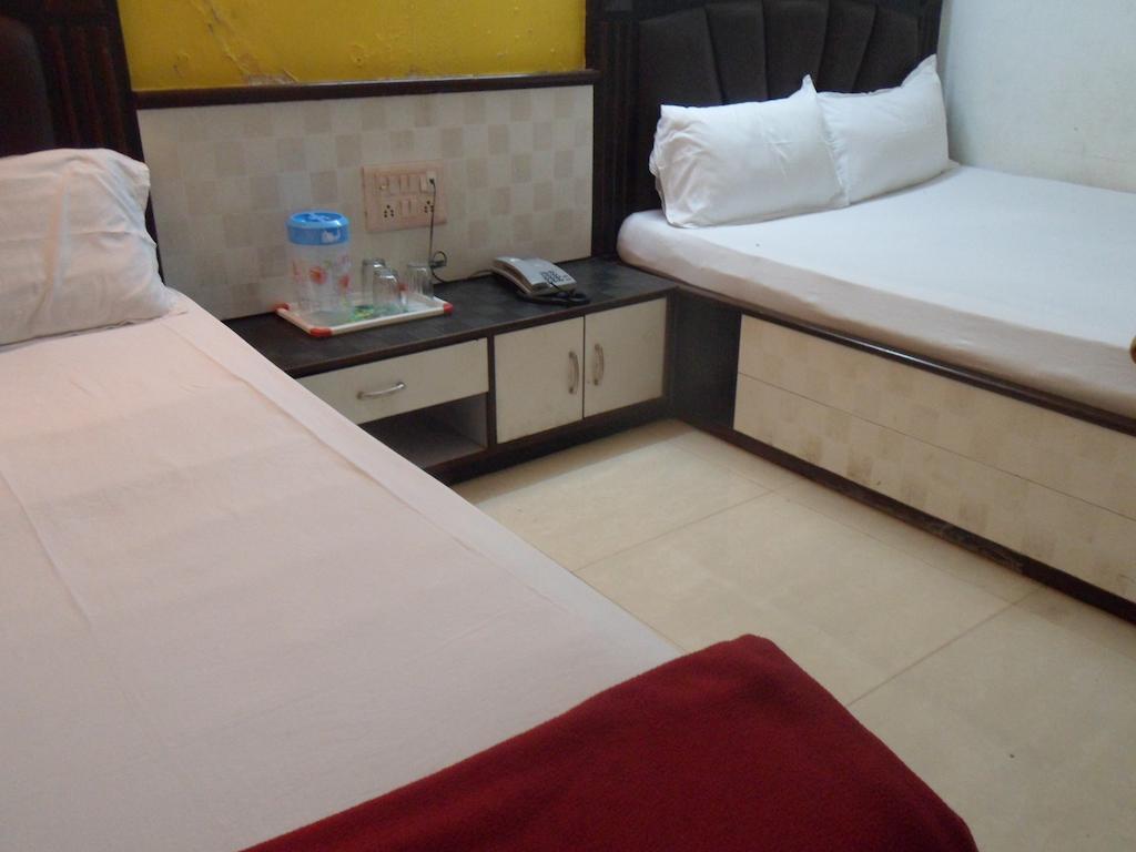 Hotel Happyland Mumbai Rom bilde