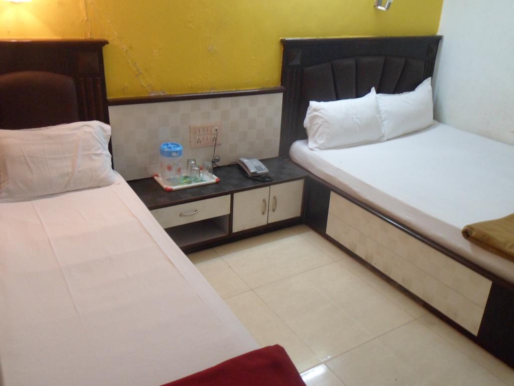 Hotel Happyland Mumbai Rom bilde